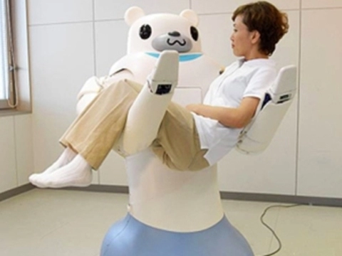 Японский робот-сиделка [будет носить пациентов на руках]